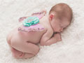 Consulter la fiche détaillée : Bella Véra Photos - Photographe de bébés